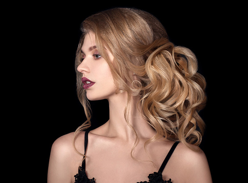 extensions-1 woman with blonde hair in a ponytail image for extensions service